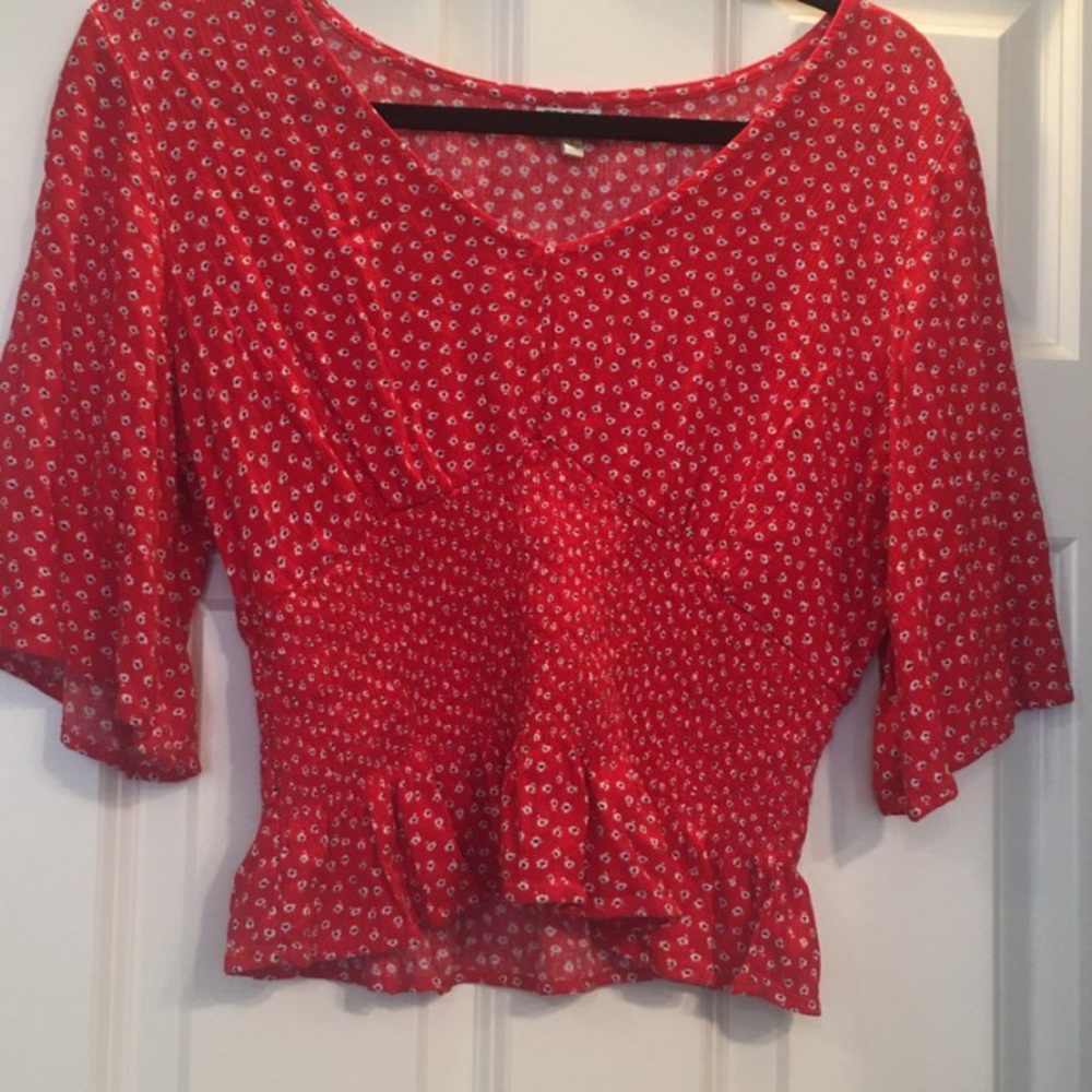 Red floral peasant top.